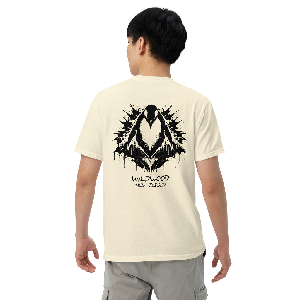 Rorschach Series Penguin garment-dyed heavyweight tee back view on male model in ivory featuring black Rorschach ink-blot penguin design with "Wildwood New Jersey" text – 17th & Surf