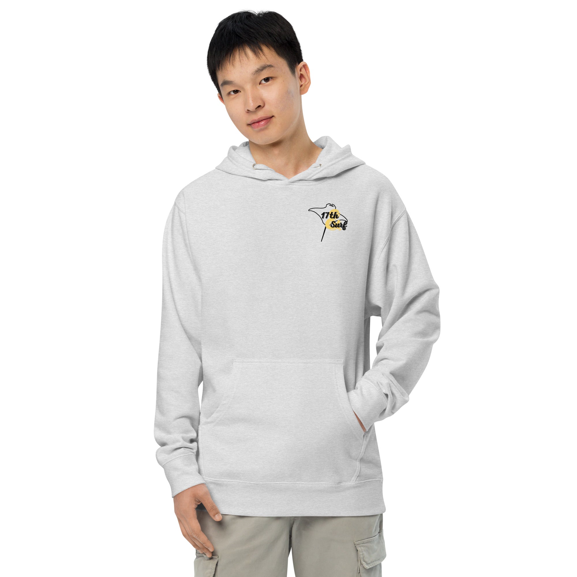 Model wearing "Resist The Siren's Call" garment-dyed heavyweight hoodie in grey heather with black and yellow "17th & Surf" manta ray chest logo, front view – 17th & Surf