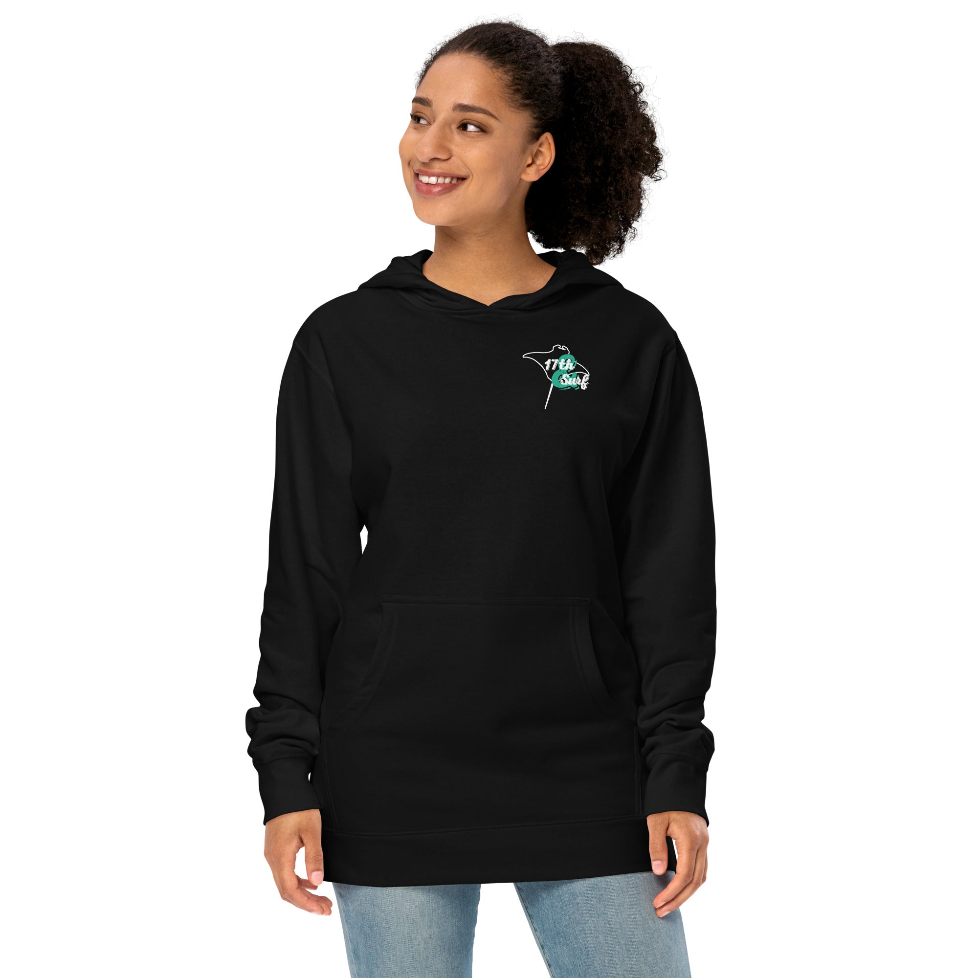 Model wearing "Resist The Siren's Call" garment-dyed heavyweight hoodie in black with white and teal "17th & Surf" manta ray chest logo, front angle view – 17th & Surf