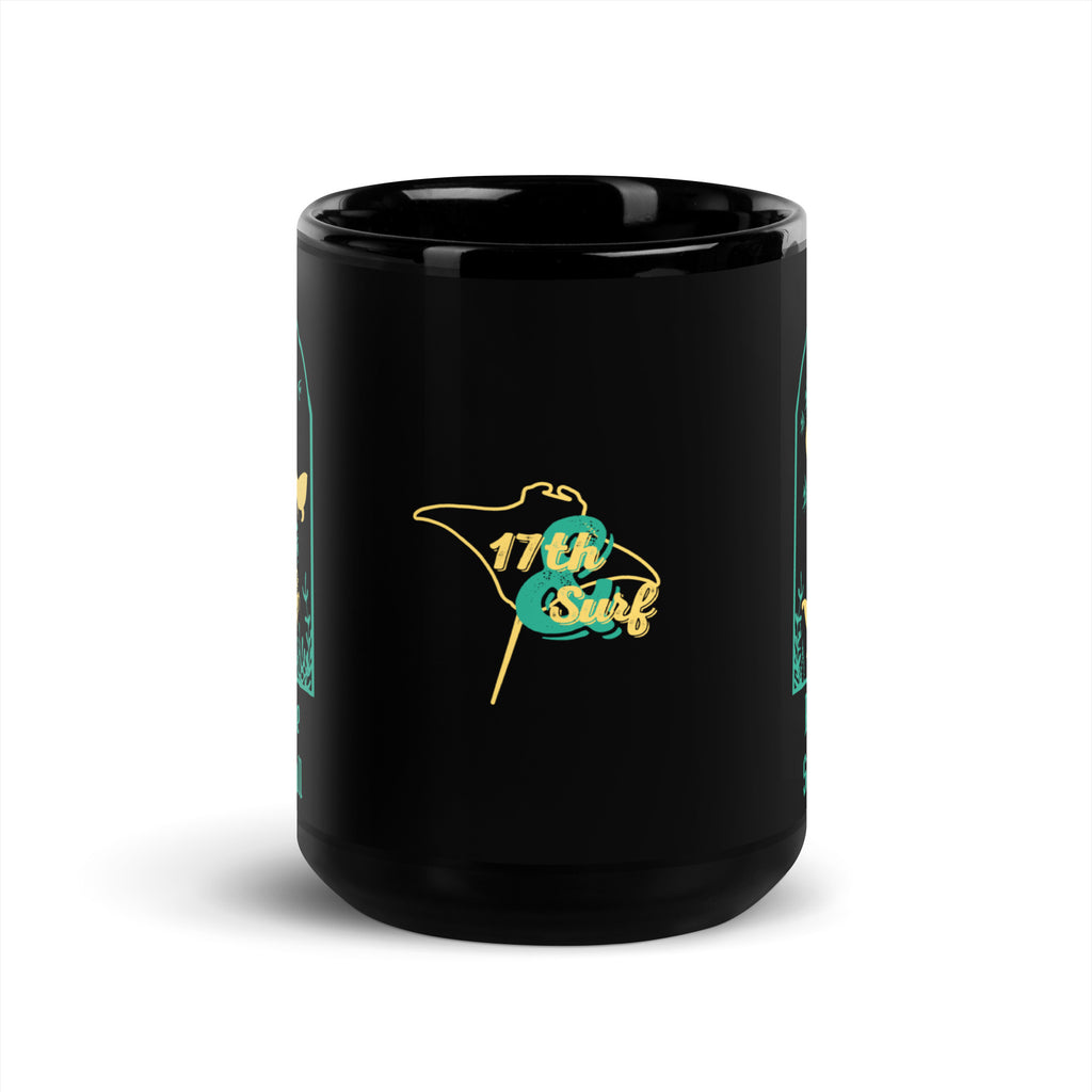 "Resist The Siren's Call" 15oz mug in black, front-center view featuring yellow and teal "17th & Surf" manta ray logo – 17th & Surf