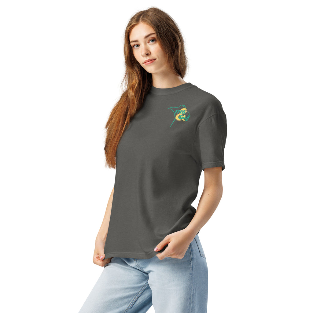 Model wearing "Resist The Siren's Call" color print garment-dyed heavyweight t-shirt in pepper gray with teal and yellow "17th & Surf" manta ray chest logo, front angle view – 17th & Surf