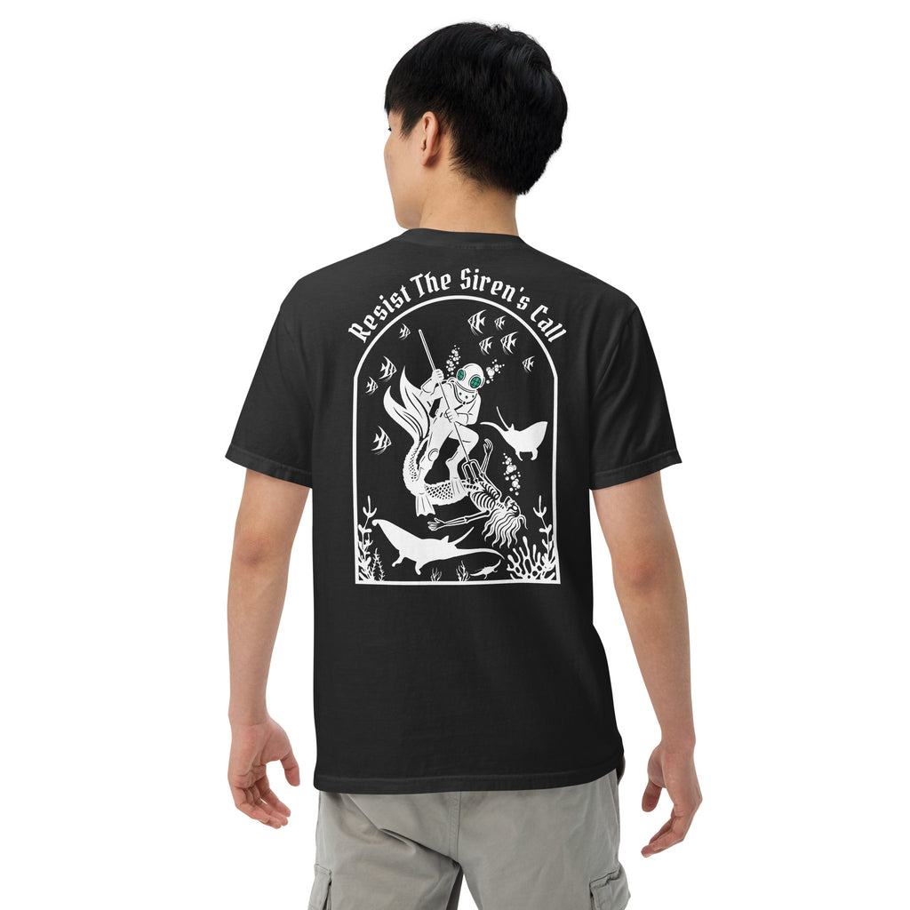 Model wearing "Resist The Siren's Call" white print garment-dyed heavyweight t-shirt in black, back view featuring white arched graphic of a deep-sea diver spearing a mermaid skeleton surrounded by fish and manta rays – 17th & Surf