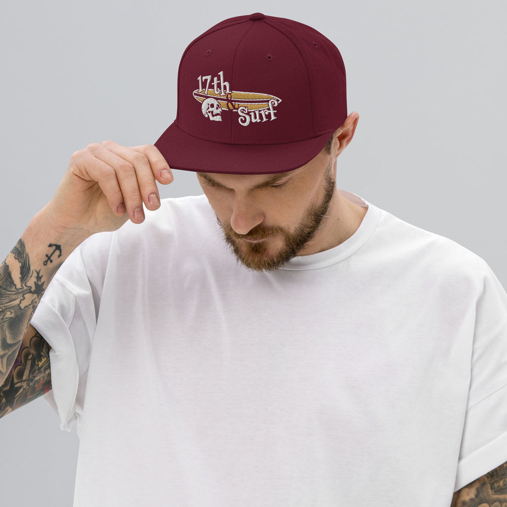 "Forever Waiting For The Next Wave" Maroon snapback hat, third front view, embroidered with the skull and surfboard logo from the meditating skeleton surfer design – Forever Waiting For The Next Wave Collection by 17th & Surf