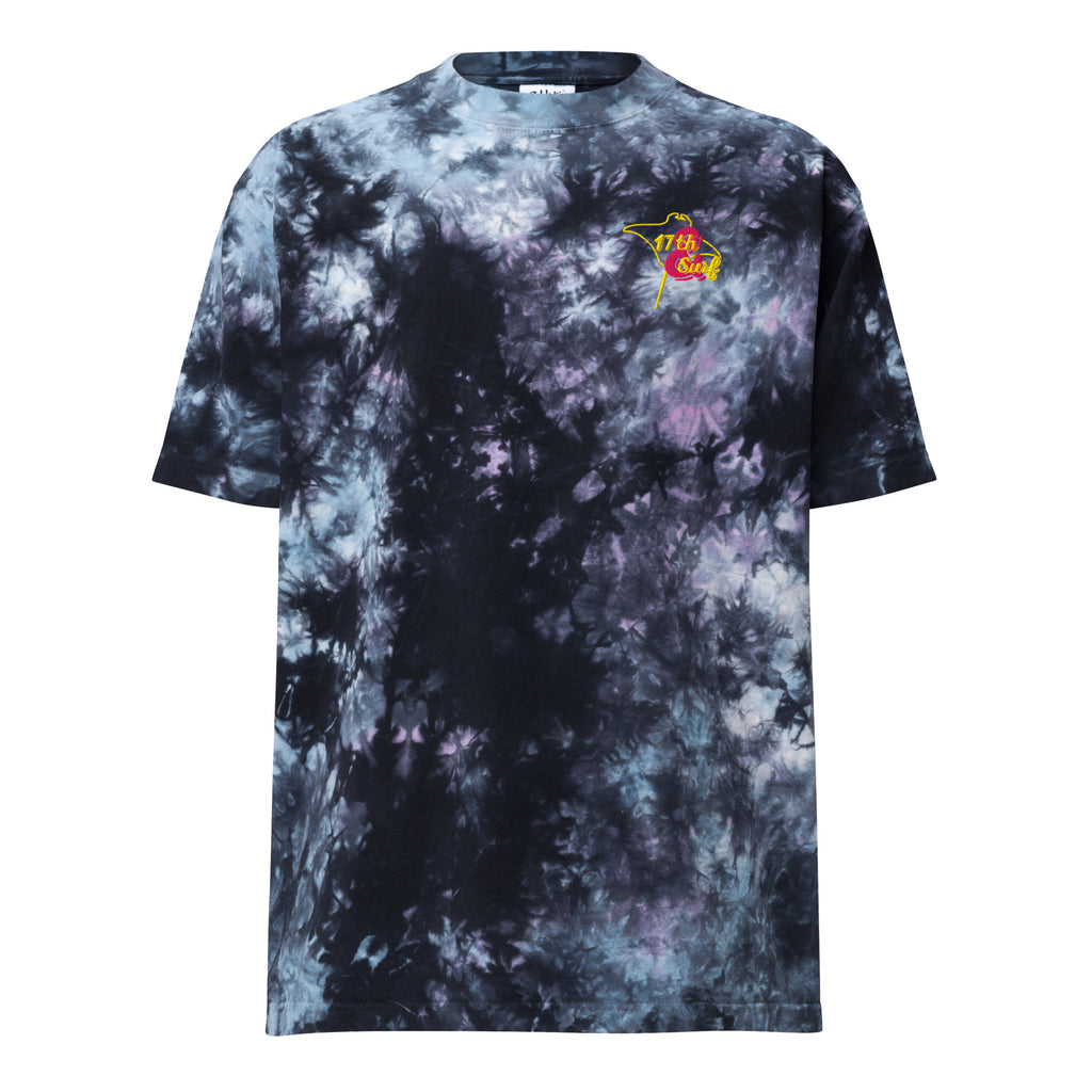 "Stingray" oversized tie-dye tee flat lay in a black, white, and purple "milky way" wash, featuring a small embroidered stingray-shaped "17th & Surf" chest logo – 17th & Surf