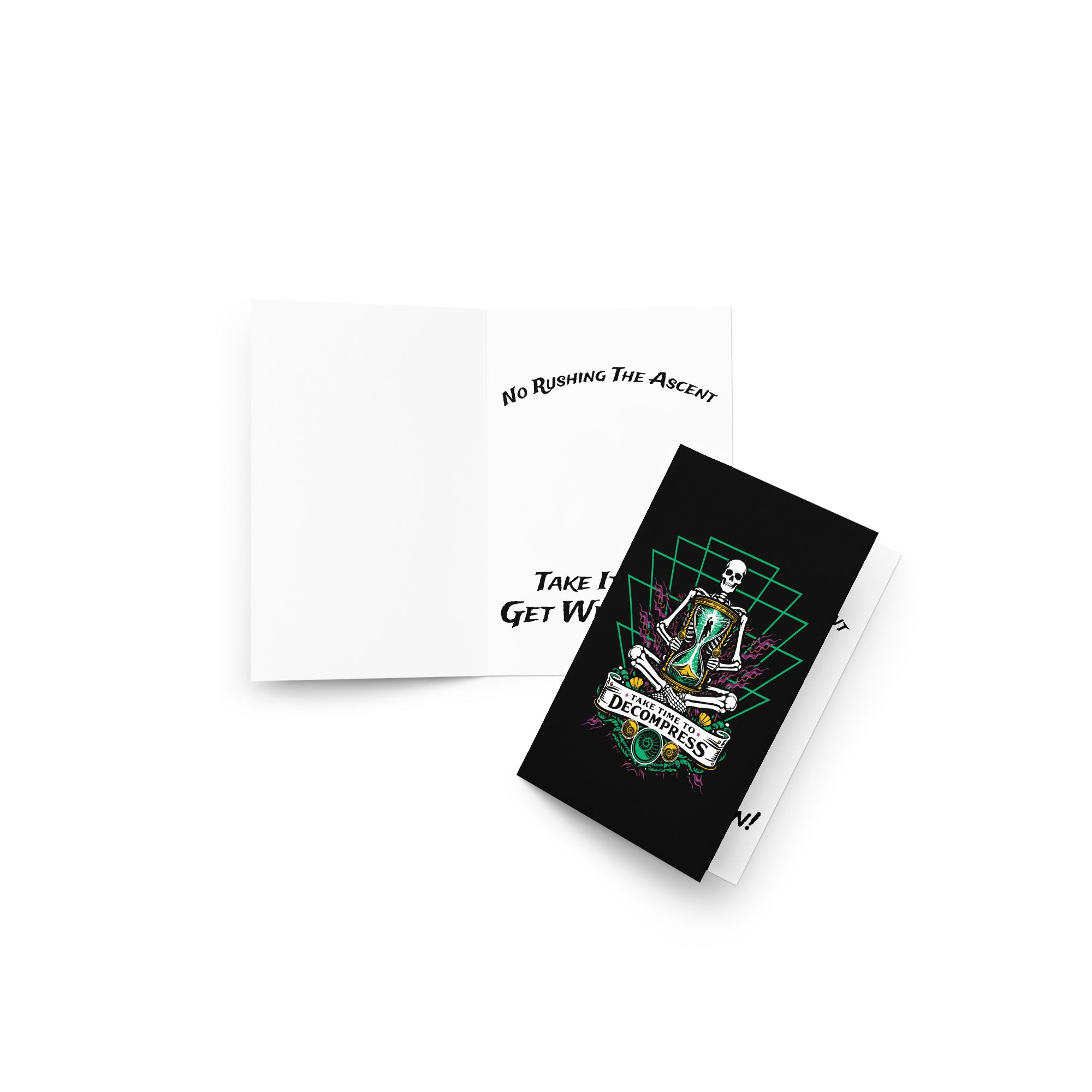 "Take Time To Decompress" Get Well Soon Card, front cover detail view, featuring a meditating skeleton holding a glowing hourglass with a tiny silhouette inside, framed by a green geometric pyramid pattern with purple coral accents and gold ammonite shells, above a "Take Time To Decompress" banner – 17th & Surf