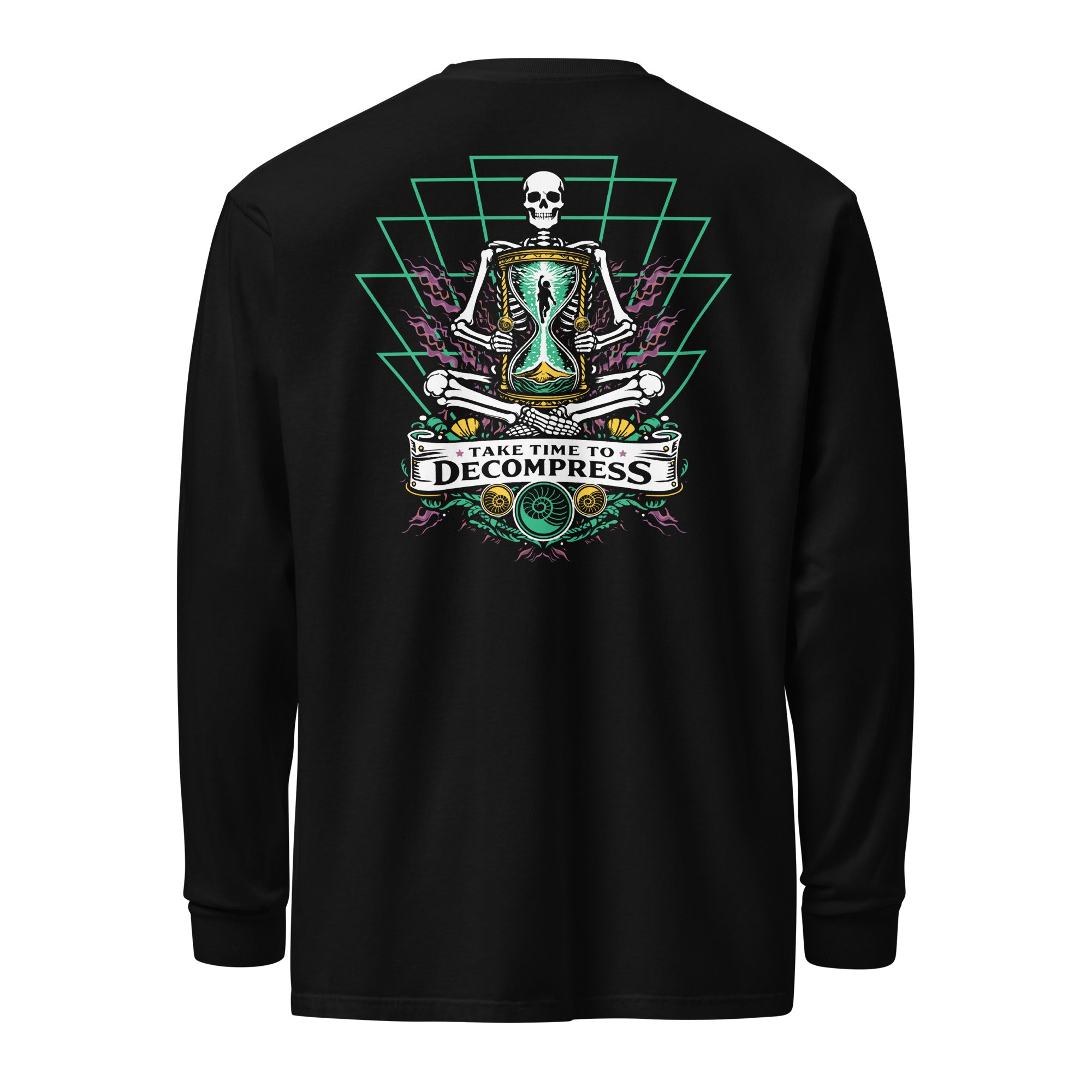 "Take Time To Decompress" black heavyweight long sleeve shirt, back flat lay, featuring a meditating skeleton holding a glowing hourglass with a tiny silhouette inside, framed by a green geometric pyramid pattern with purple coral accents and gold ammonite shells, above a "Take Time To Decompress" banner – 17th & Surf