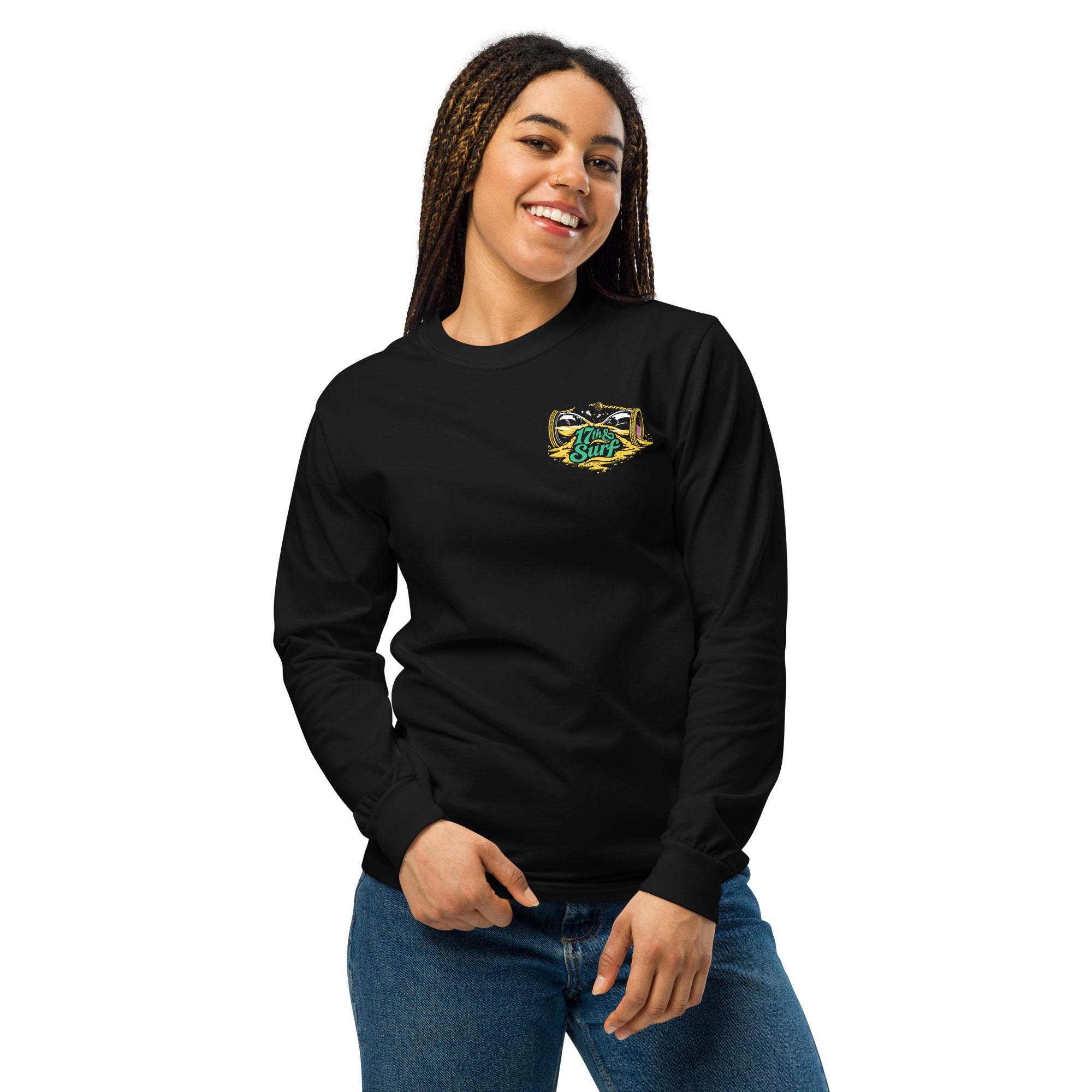 "Take Time To Decompress" black heavyweight long sleeve shirt on female model, front view, featuring a small gold and teal "17th & Surf" hourglass logo on the left chest – 17th & Surf