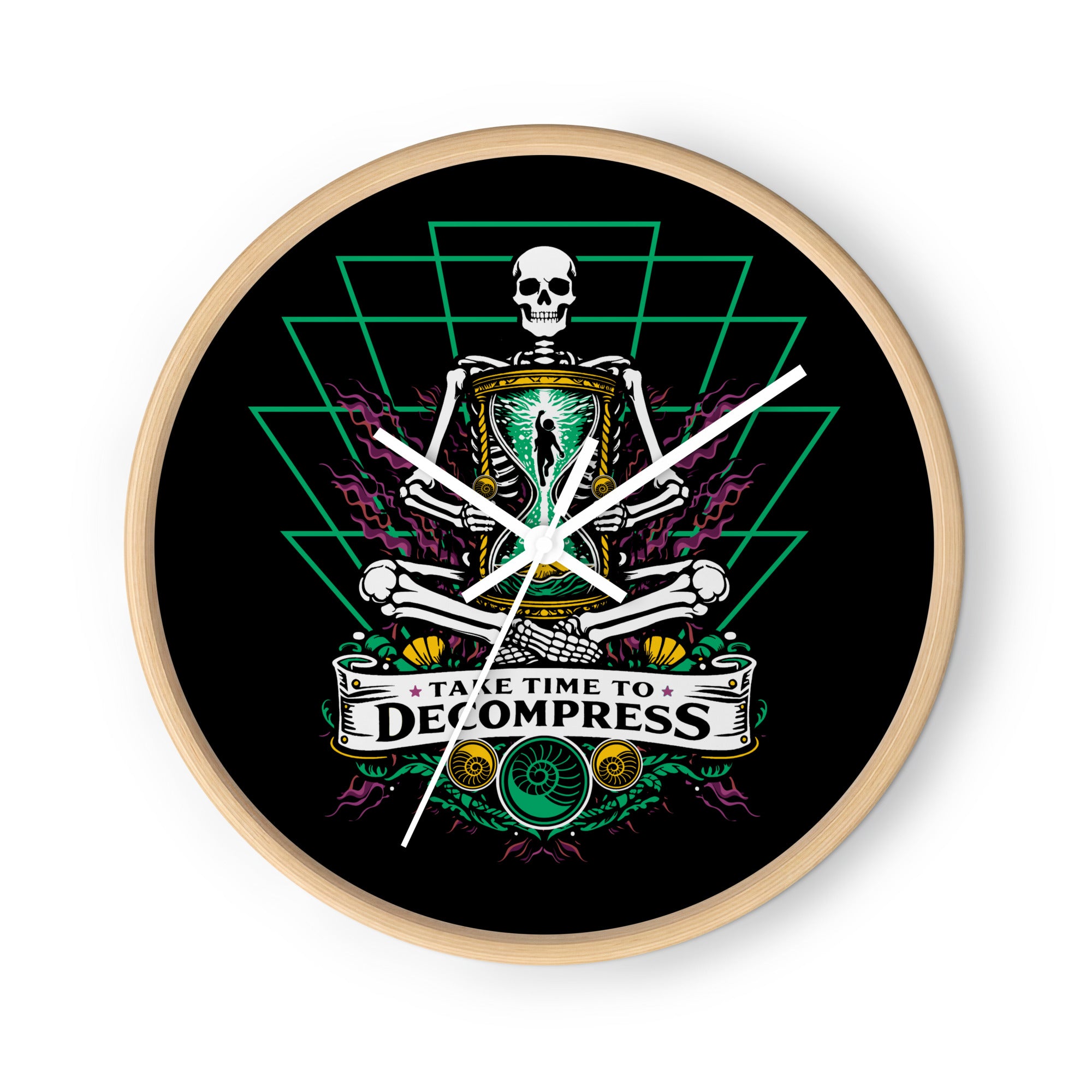 "Take Time To Decompress" wooden 10" wall clock, front view, featuring a meditating skeleton holding a glowing hourglass with a tiny silhouette inside, framed by a green geometric pyramid pattern with purple coral accents and gold ammonite shells, above a "Take Time To Decompress" banner; the face has no numbers, so there's no pressure – you're on island time – 17th & Surf