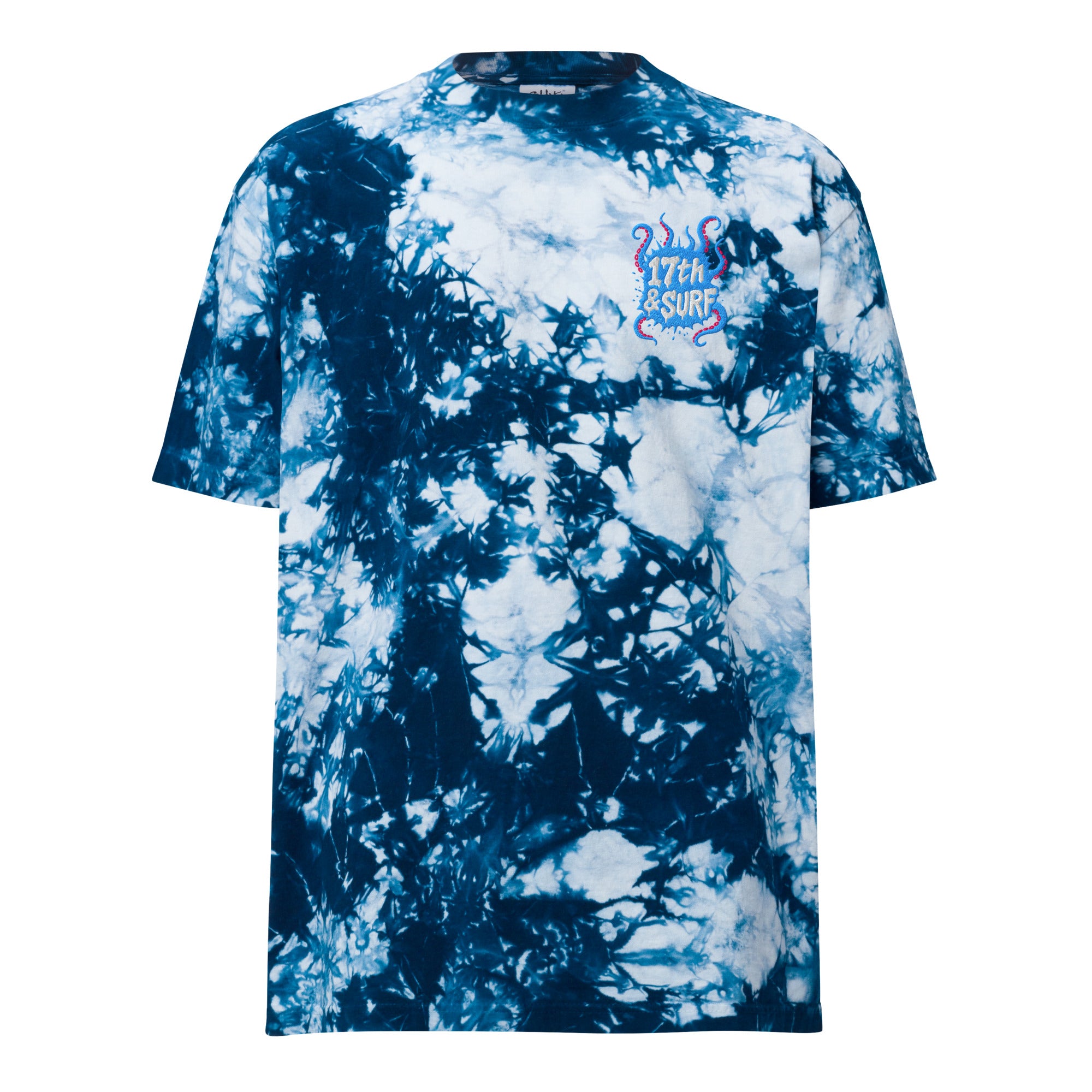 "Tentacles" oversized tie-dye tee front flat lay in navy and white showing embroidered skeleton-and-tentacle "17th & Surf" chest logo – 17th & Surf