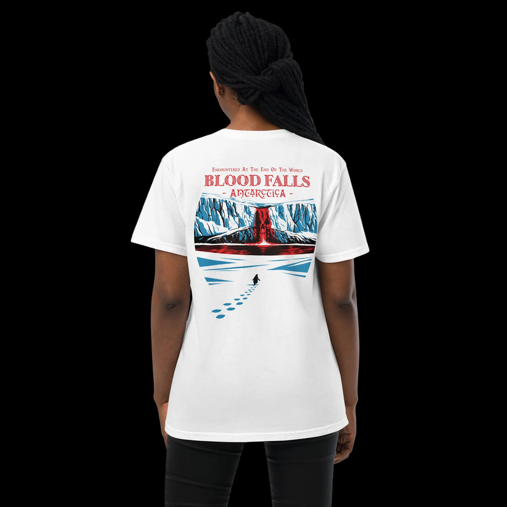 Back view of female model wearing white 17th & Surf Blood Falls Antarctica t-shirt with illustrated red waterfall flowing from glacier cliffs and "but why" penguin and its footprints in snow