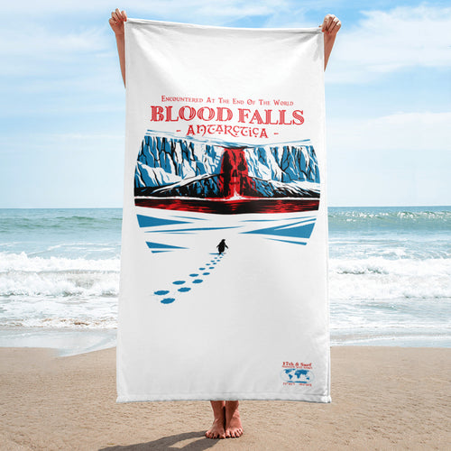 Person holding Blood Falls Antarctica beach towel with lone penguin approaching red glacier waterfall artwork inspired by Taylor Glacier (77°43′S 162°16′E) – Haunted Seas Series