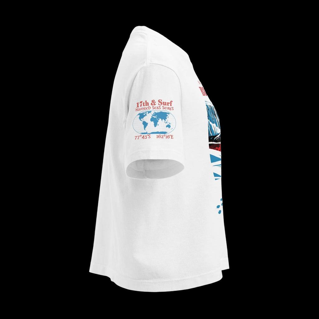 Side view of women’s white heavyweight boxy tee with Haunted Seas sleeve patch showing coordinates 77°43'S 162°16'E